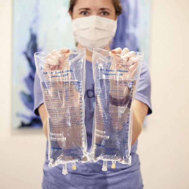 Nurse with iv bags